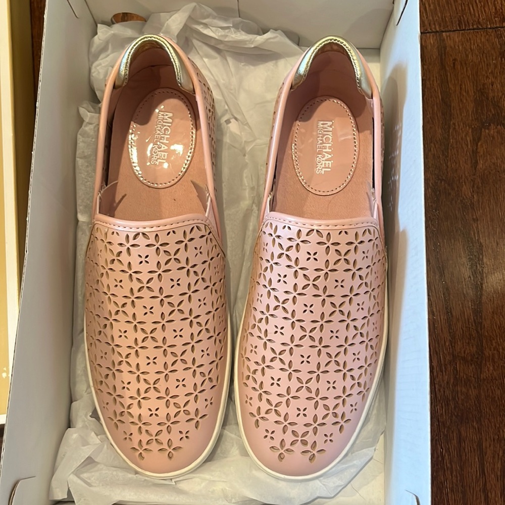 Lightly worn pink Michael Kors slip on shoes in size 6.5